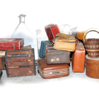 many assorted vintage suitcases
